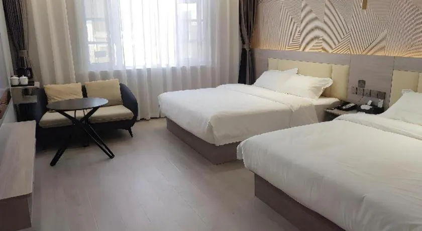 Bed in Borrman Hotel Pingyi Beifang Shicaicheng Mingde Road