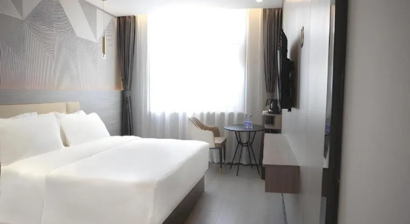 Bed in Borrman Hotel Pingyi Beifang Shicaicheng Mingde Road