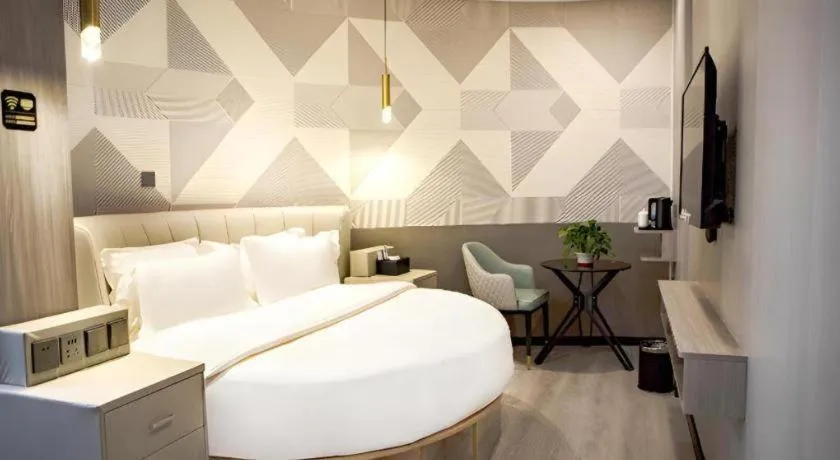 Bed in Borrman Hotel Pingyi Beifang Shicaicheng Mingde Road