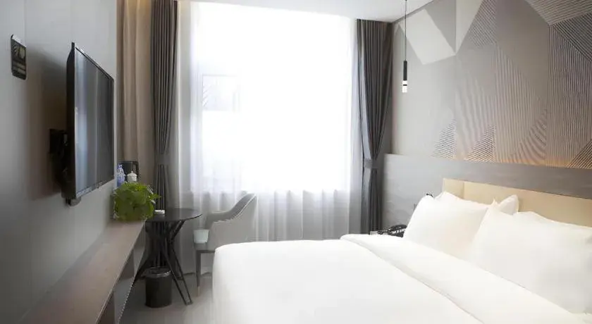 Bed in Borrman Hotel Pingyi Beifang Shicaicheng Mingde Road Bed in Borrman Hotel Pingyi Beifang Shicaicheng Mingde Road