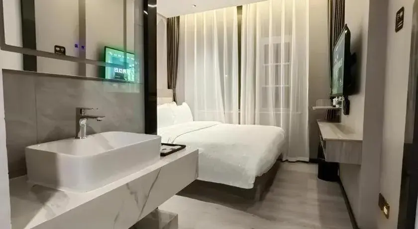 Bed in Borrman Hotel Pingyi Beifang Shicaicheng Mingde Road Bed in Borrman Hotel Pingyi Beifang Shicaicheng Mingde Road