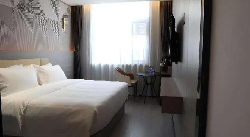 Bed in Borrman Hotel Pingyi Beifang Shicaicheng Mingde Road Bed in Borrman Hotel Pingyi Beifang Shicaicheng Mingde Road