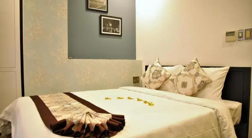 Bed in J&B Hotel & Apartment Bed in J&B Hotel & Apartment