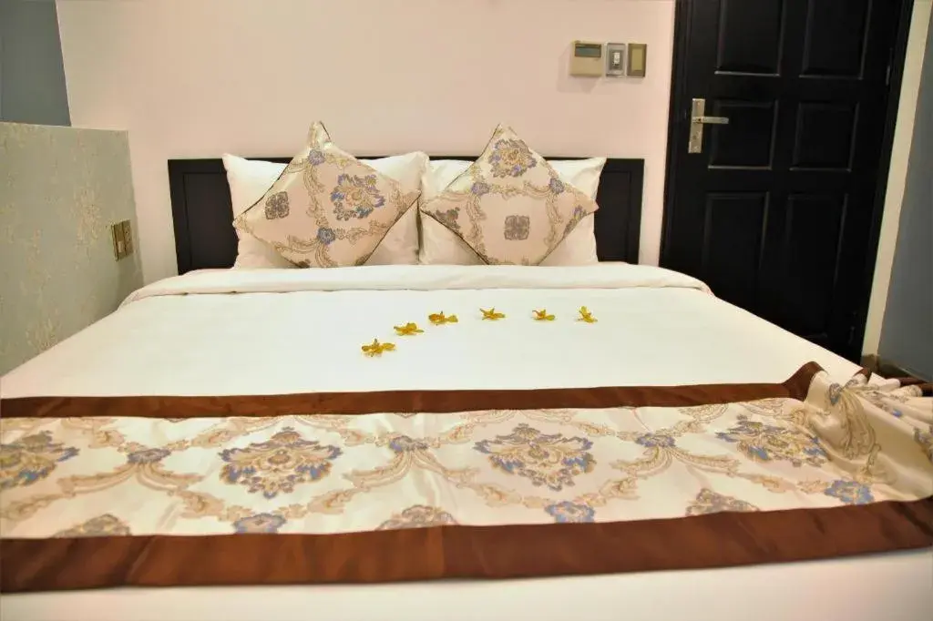 Bed in J&B Hotel & Apartment Bed in J&B Hotel & Apartment