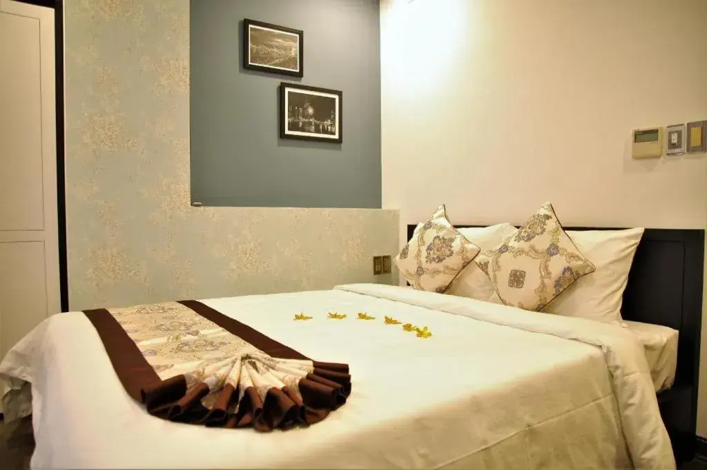 Bed in J&B Hotel & Apartment Bed in J&B Hotel & Apartment