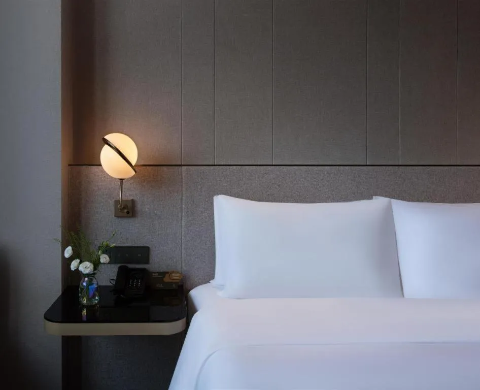 Bed in Onejee Hotel Shenzhen