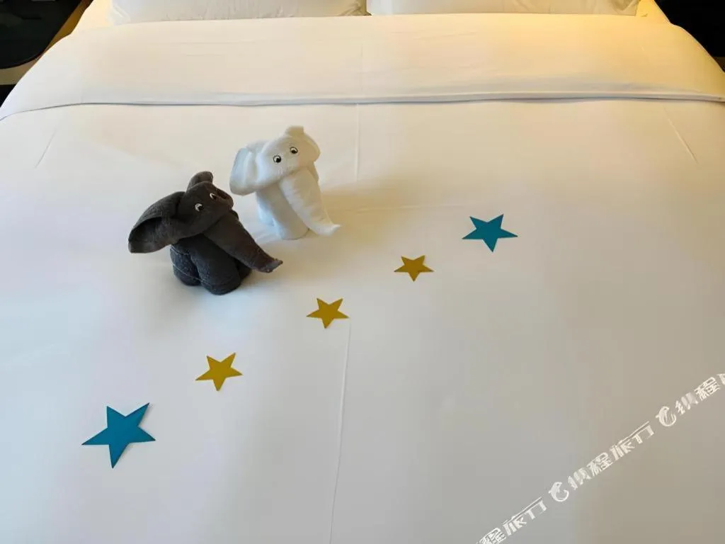 Bed in Onejee Hotel Shenzhen