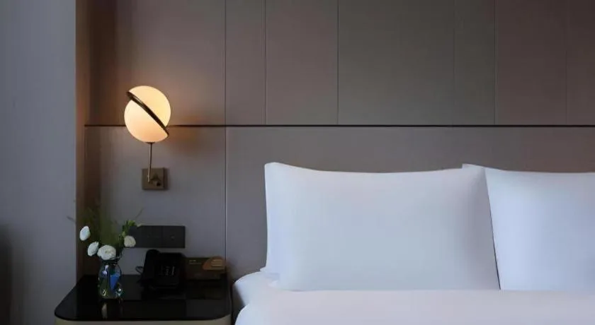 Bed in Onejee Hotel Shenzhen