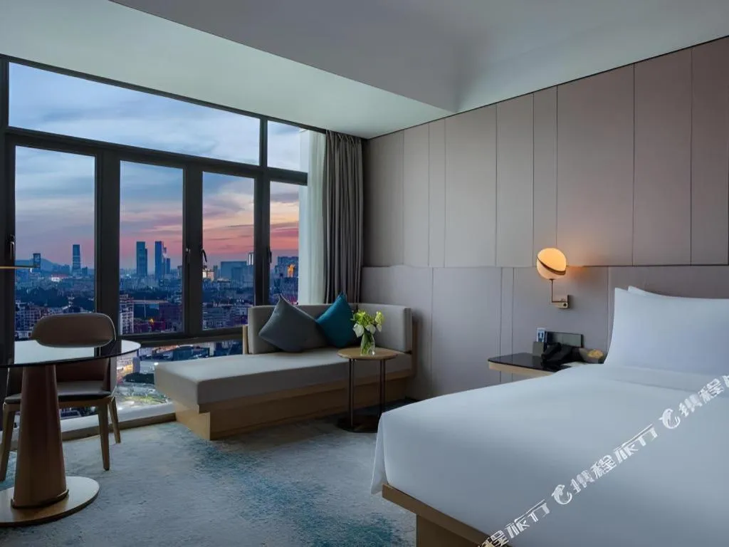 Bed in Onejee Hotel Shenzhen