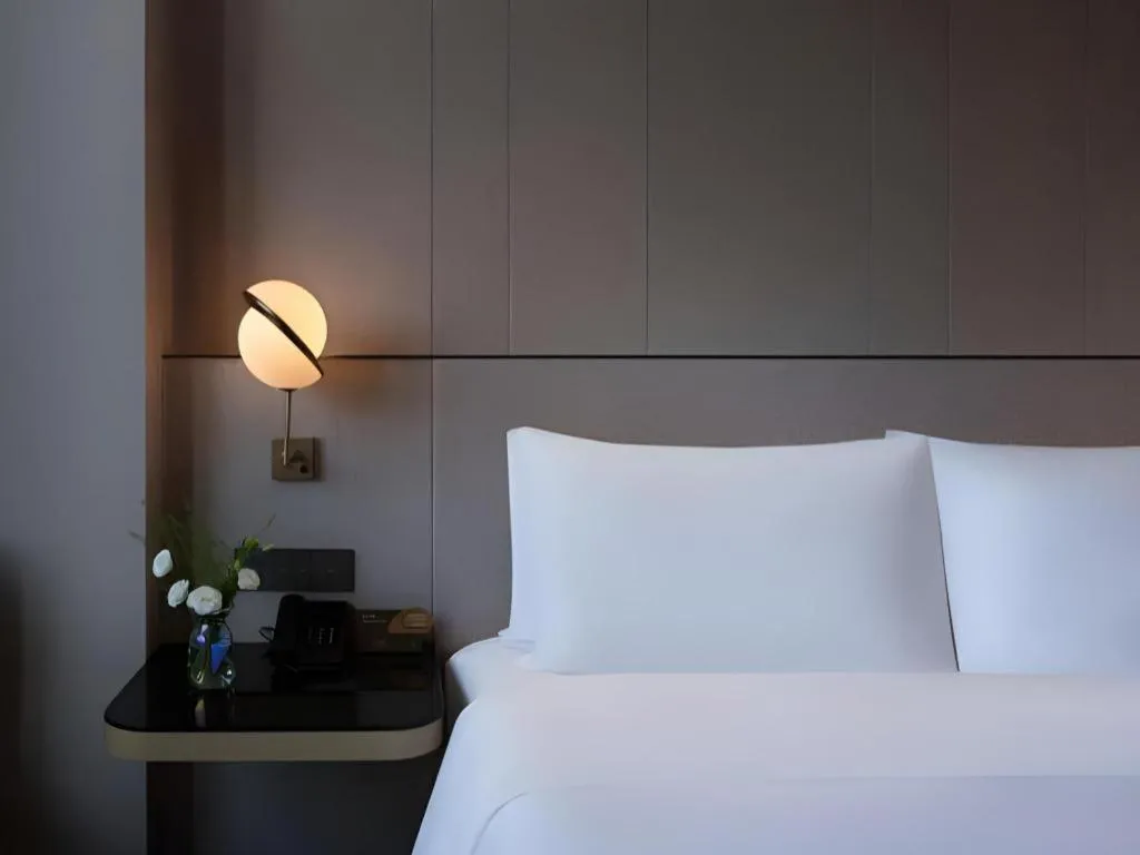 Bed in Onejee Hotel Shenzhen