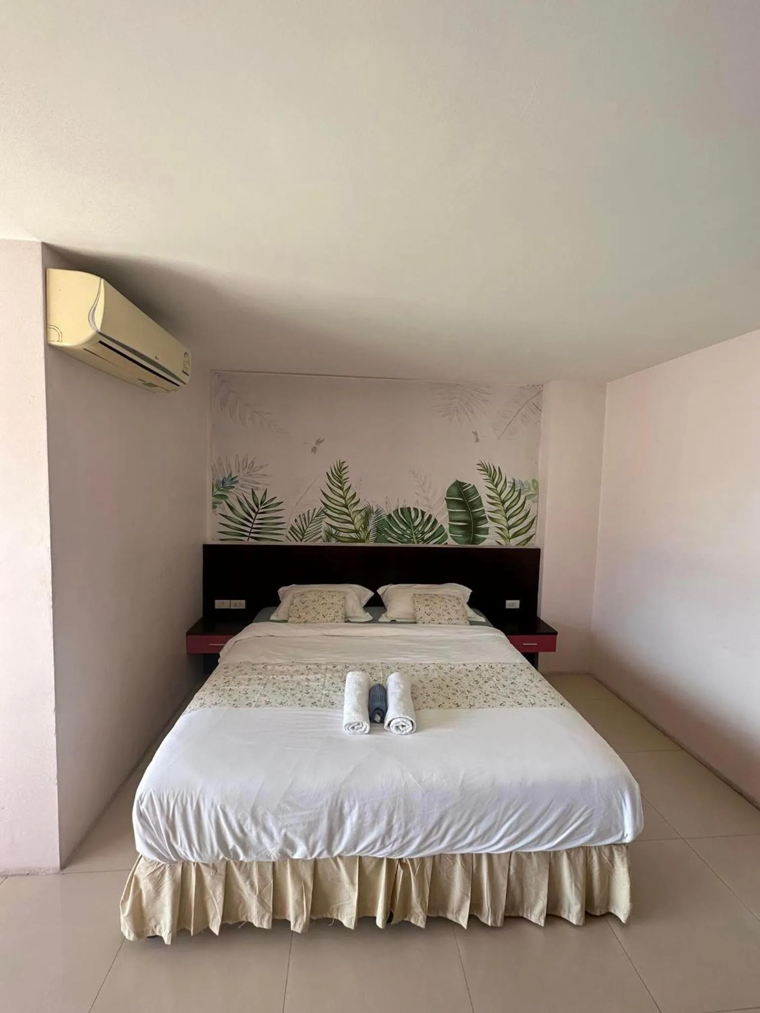 Bed in Sunflower HLD Hotel