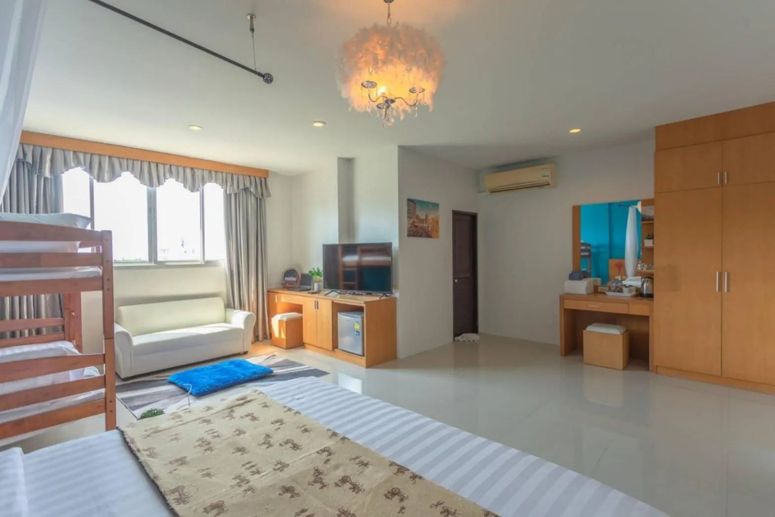 Bed in Sunflower HLD Hotel