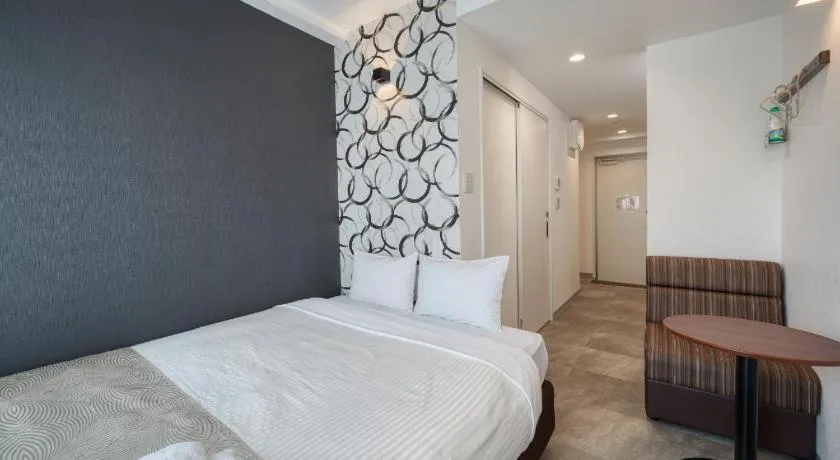 Bed in BIBI hotel kokusaidori