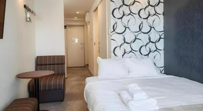 Bed in BIBI hotel kokusaidori