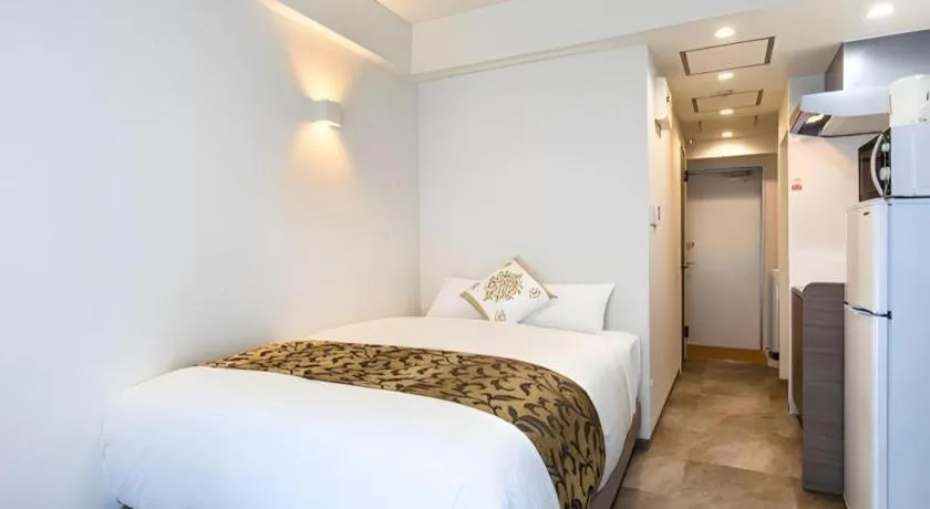 Bed in BIBI hotel kokusaidori