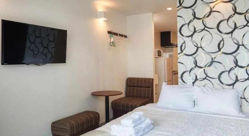 Bed in BIBI hotel kokusaidori