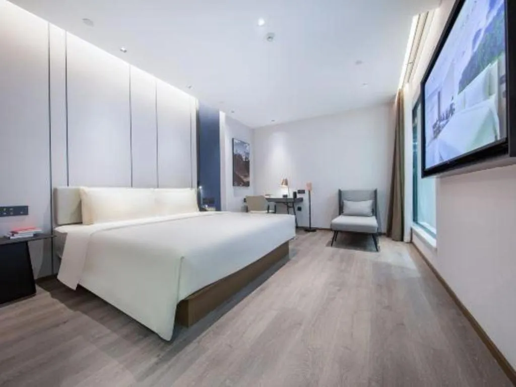 Bed in Atour Hotel Jinan Tangyan Century Avenue