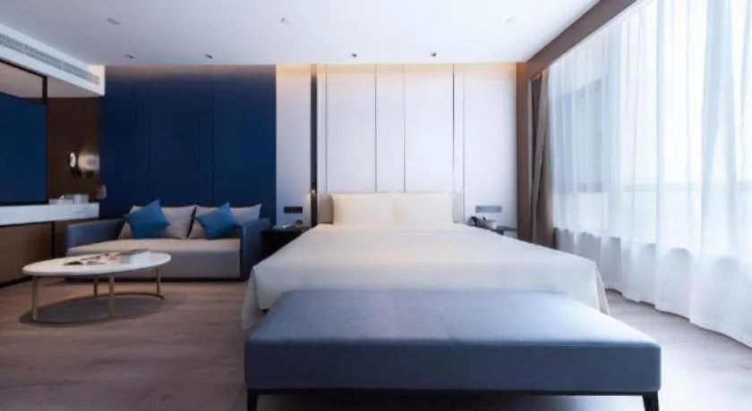 Bed in Atour Hotel Jinan Tangyan Century Avenue
