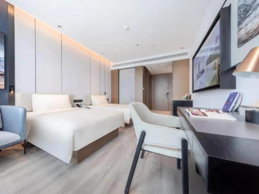 Bed in Atour Hotel Jinan Tangyan Century Avenue