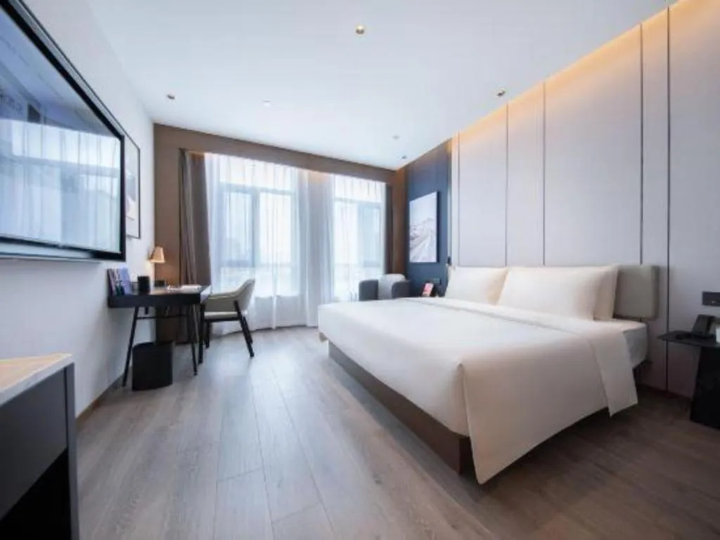 Bed in Atour Hotel Jinan Tangyan Century Avenue