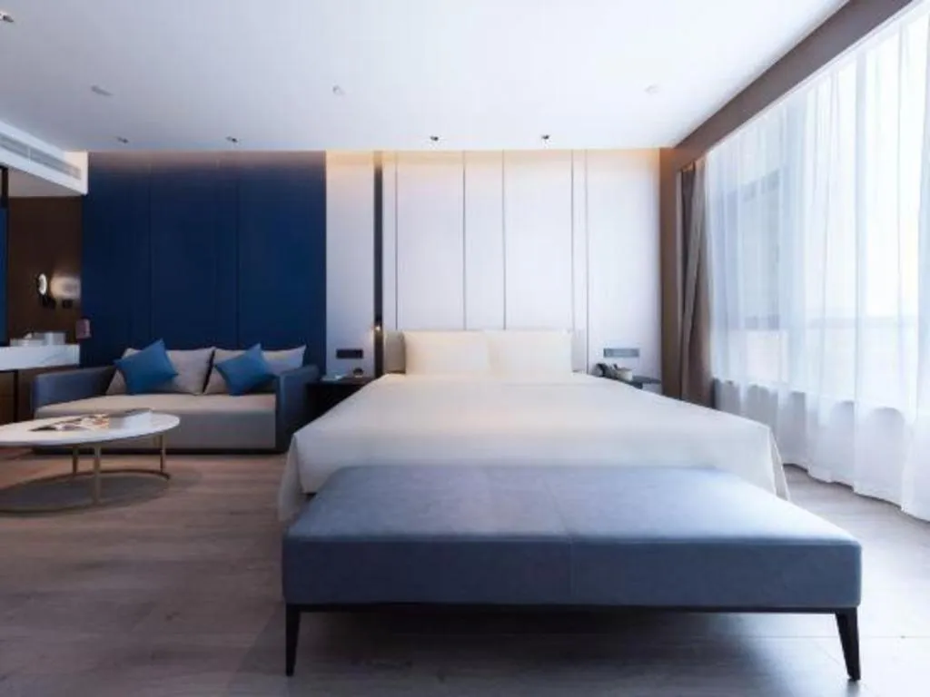 Bed in Atour Hotel Jinan Tangyan Century Avenue