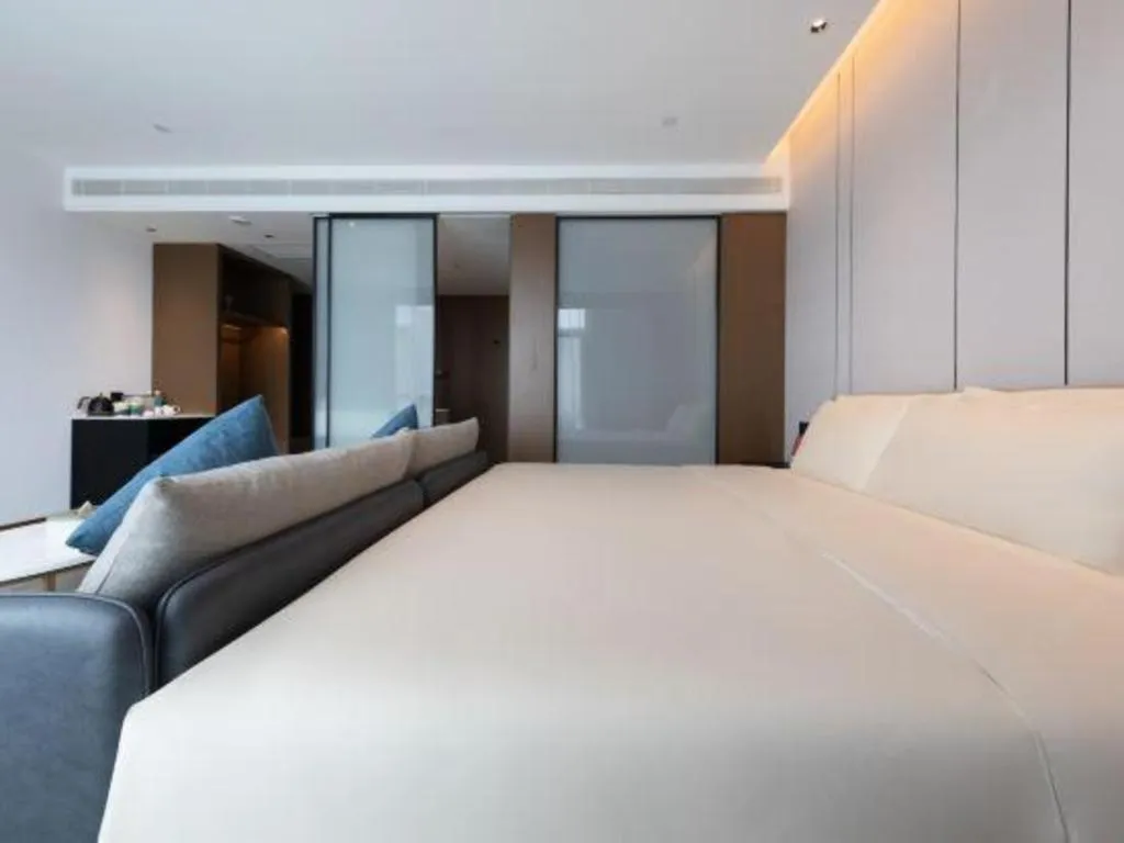 Bed in Atour Hotel Jinan Tangyan Century Avenue