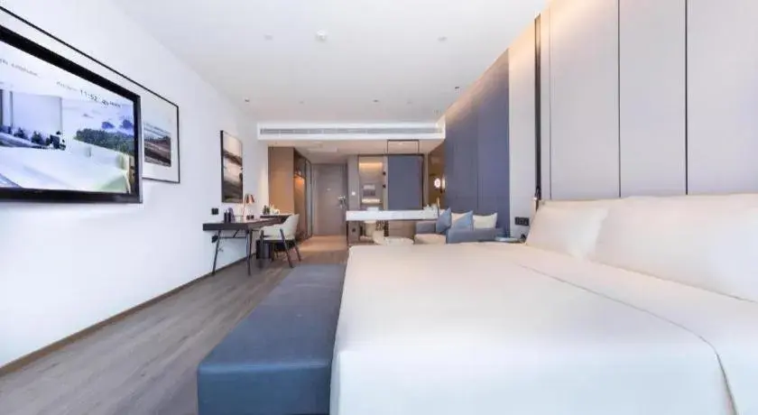 Bed in Atour Hotel Jinan Tangyan Century Avenue Bed in Atour Hotel Jinan Tangyan Century Avenue