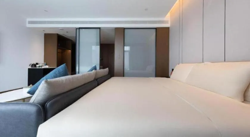 Bed in Atour Hotel Jinan Tangyan Century Avenue
