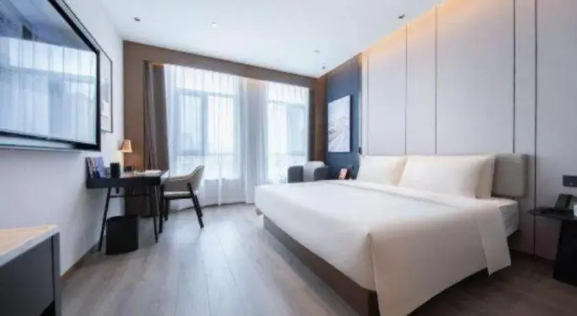 Bed in Atour Hotel Jinan Tangyan Century Avenue Bed in Atour Hotel Jinan Tangyan Century Avenue