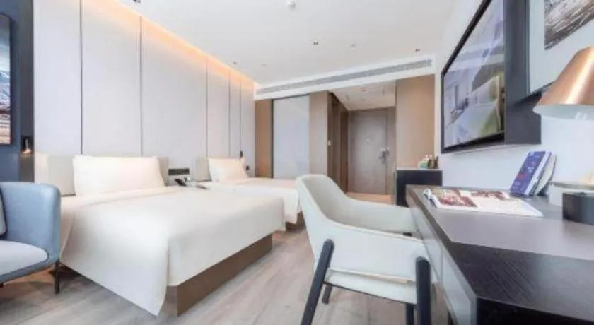 Bed in Atour Hotel Jinan Tangyan Century Avenue