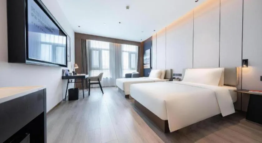 Bed in Atour Hotel Jinan Tangyan Century Avenue