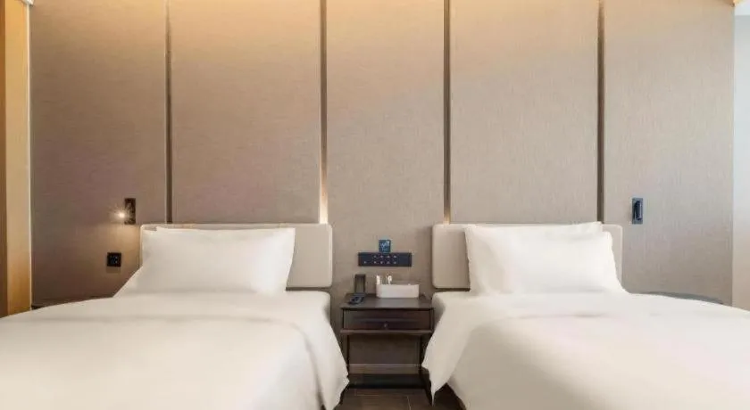 Bed in Atour Hotel Taiyuan Inner Ring