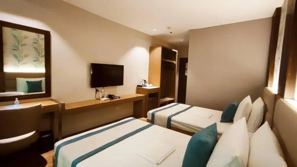 Bed in HOTEL JOHN Bed in HOTEL JOHN