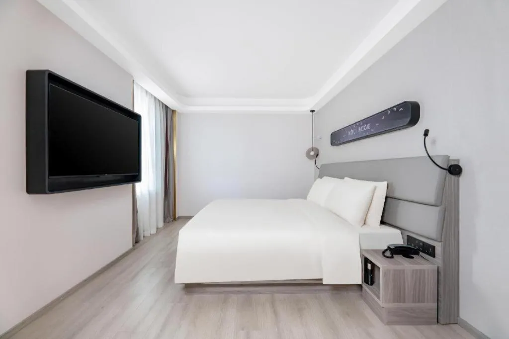 Bed in Atour Light Hotel North Dalian Station Huanan Plaza