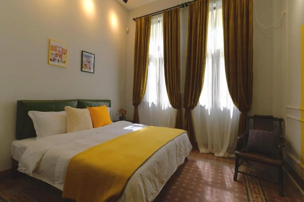 Bed in Origin Antique House and Hotel