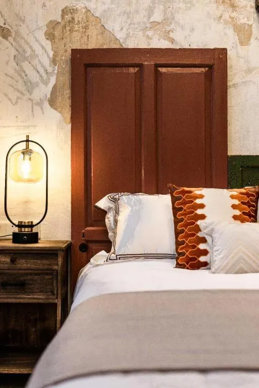 Bed in Origin Antique House and Hotel