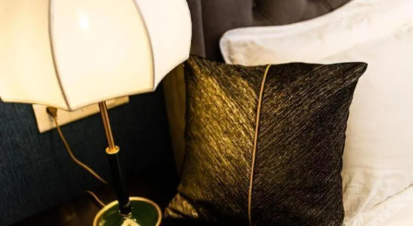 Bed in Origin Antique House and Hotel