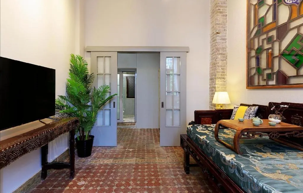 Bed in Origin Antique House and Hotel