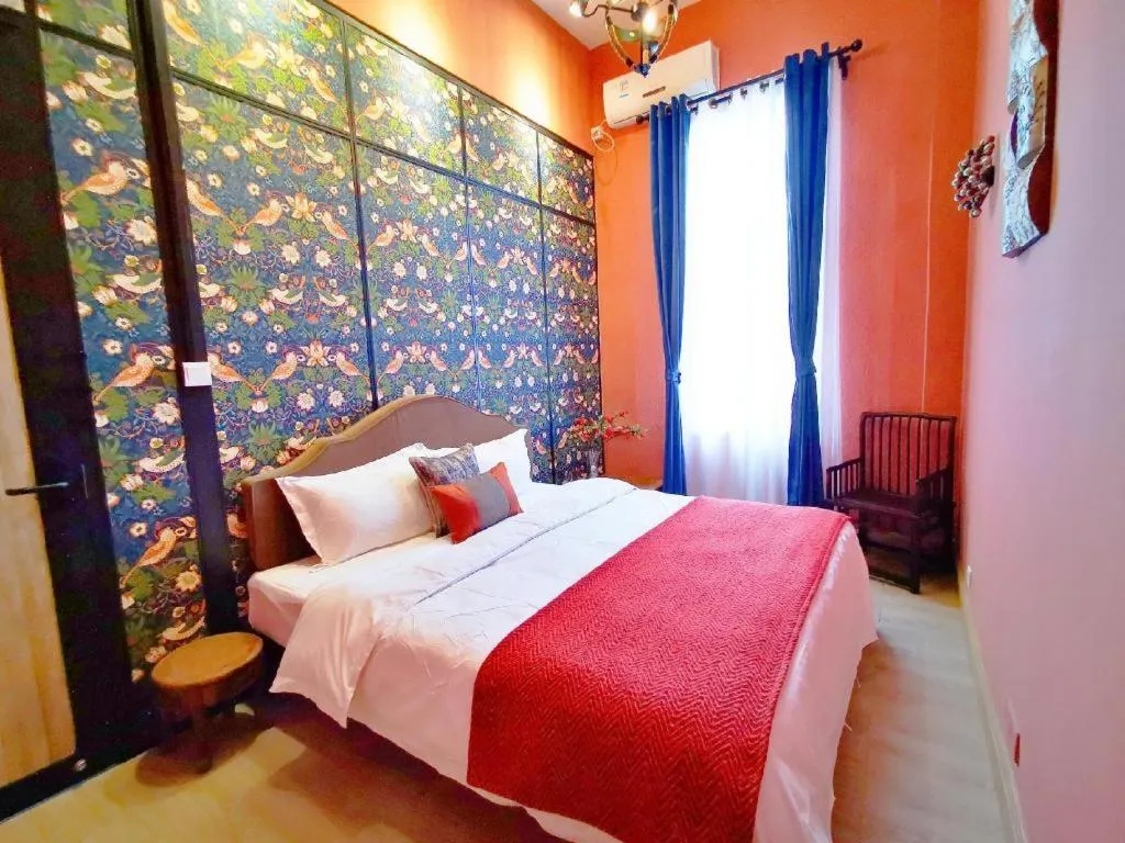 Bed in Origin Antique House and Hotel