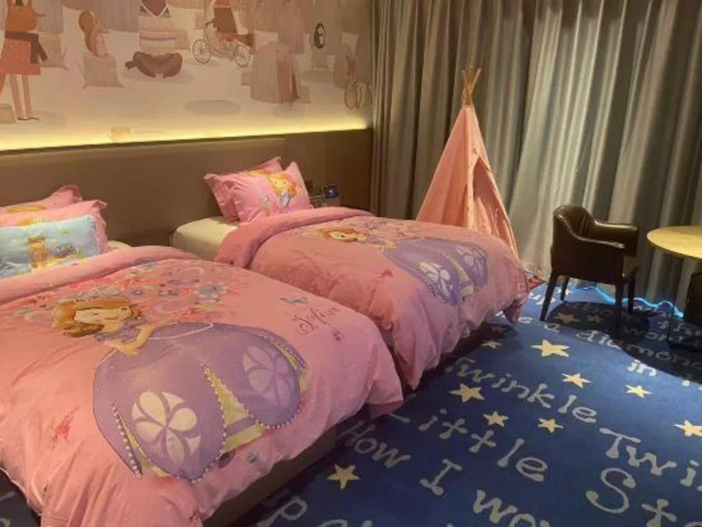 Bed in Yinhu Junyi Hotel（Wildlife Park）