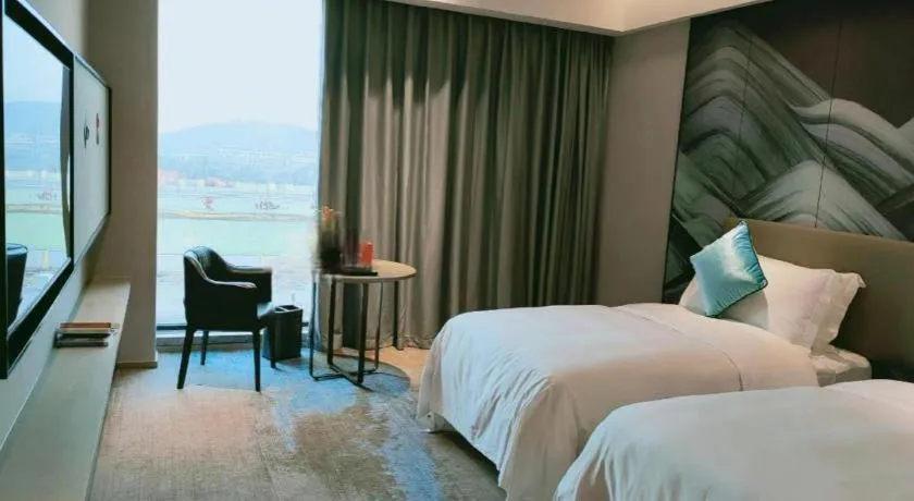 Bed in Yinhu Junyi Hotel（Wildlife Park）