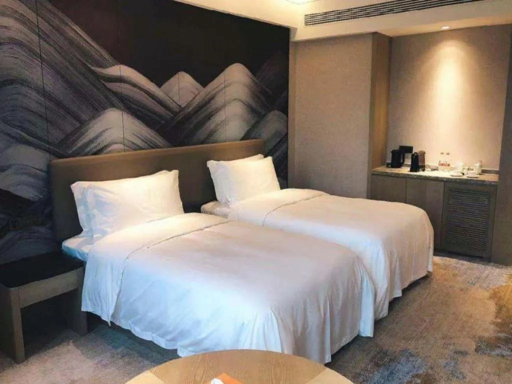 Bed in Yinhu Junyi Hotel（Wildlife Park）
