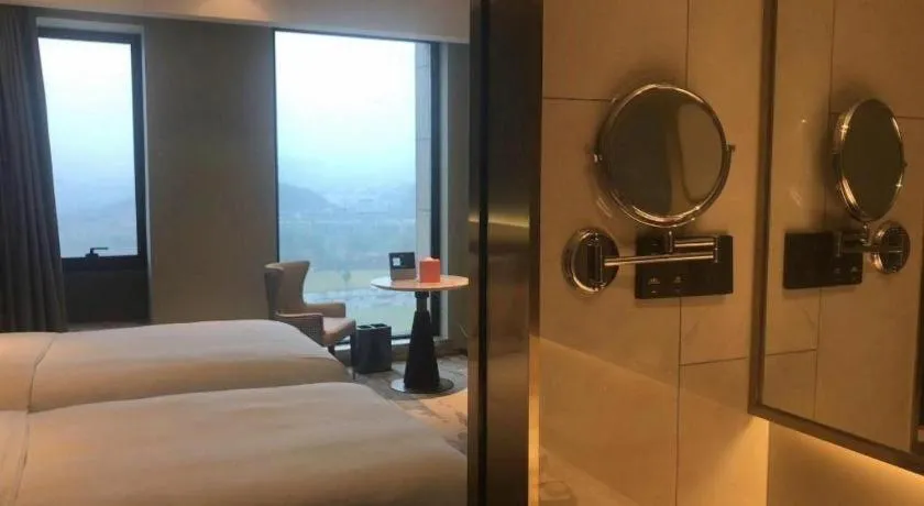 Bed in Yinhu Junyi Hotel（Wildlife Park）