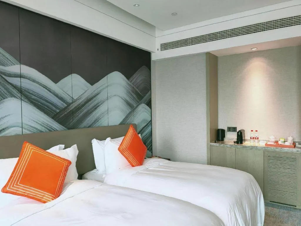 Bed in Yinhu Junyi Hotel（Wildlife Park）