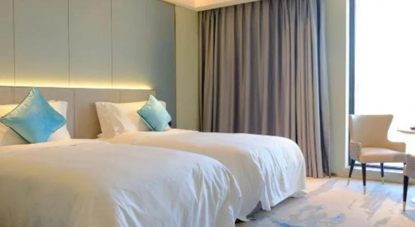 Bed in Yinhu Junyi Hotel（Wildlife Park）