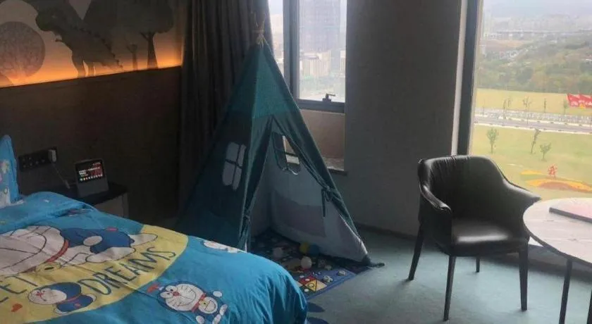 Bed in Yinhu Junyi Hotel（Wildlife Park）