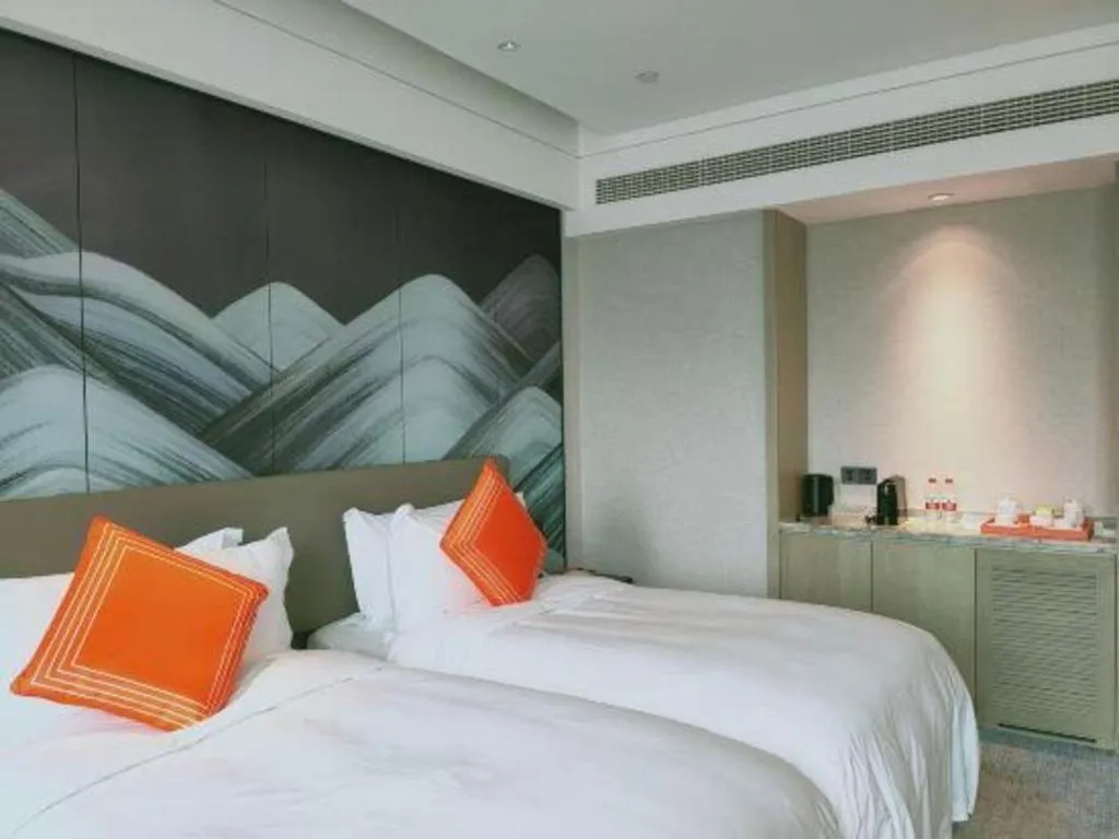 Bed in Yinhu Junyi Hotel（Wildlife Park）