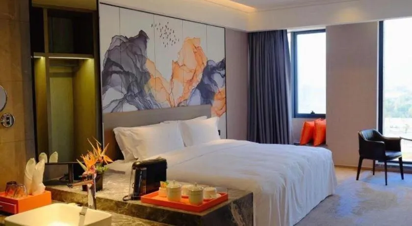 Bed in Yinhu Junyi Hotel（Wildlife Park）