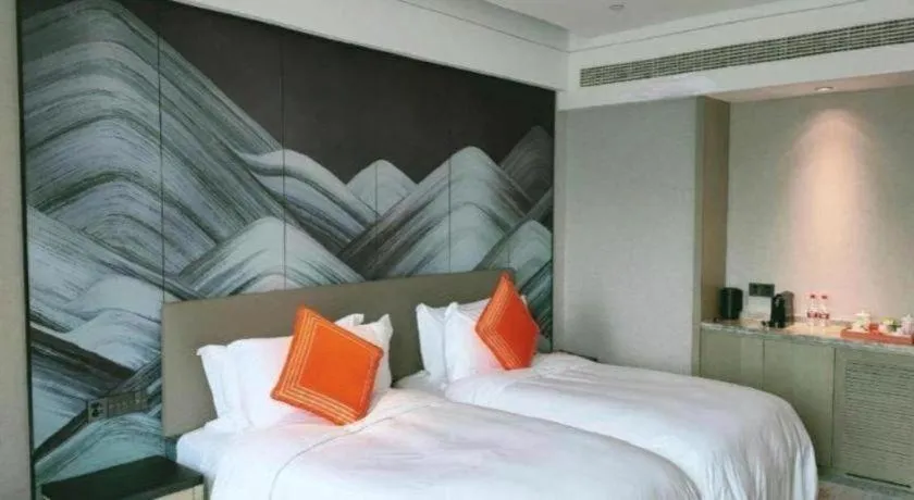 Bed in Yinhu Junyi Hotel（Wildlife Park）