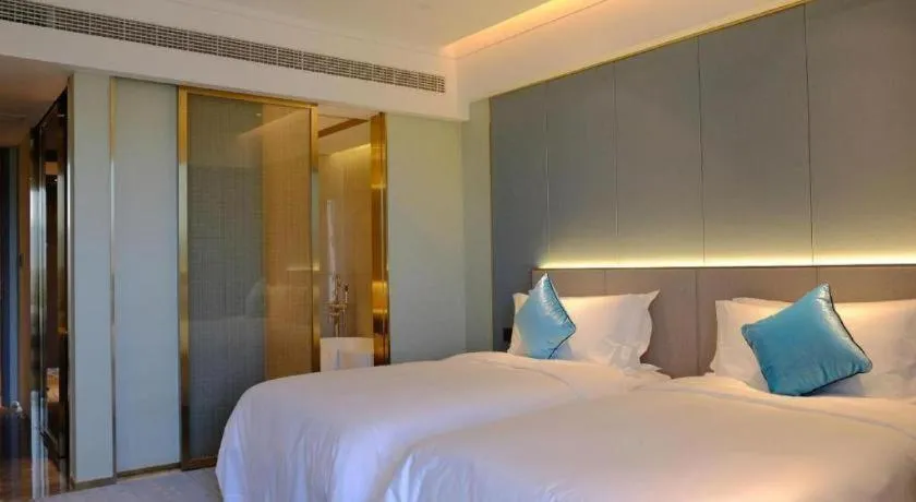 Bed in Yinhu Junyi Hotel（Wildlife Park）